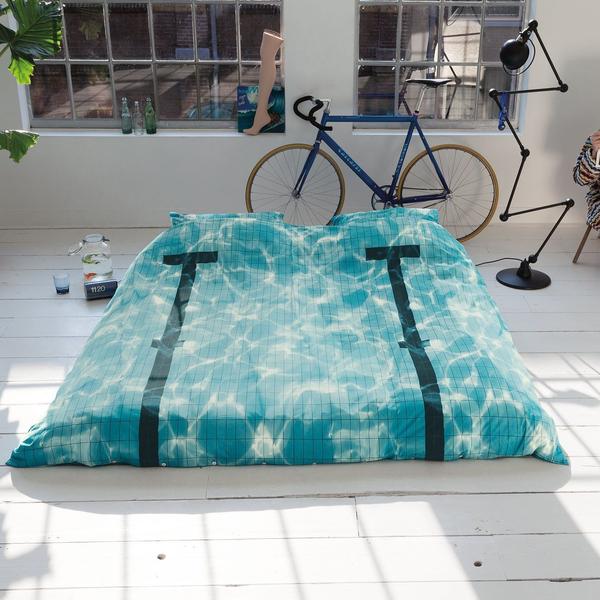 This image has an empty alt attribute; its file name is Snurk-pool-bedding.jpg